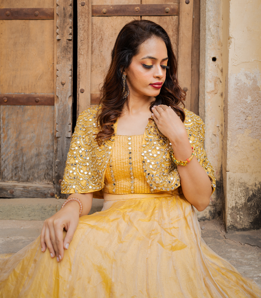 Lehenga with blouse and shoulder cape